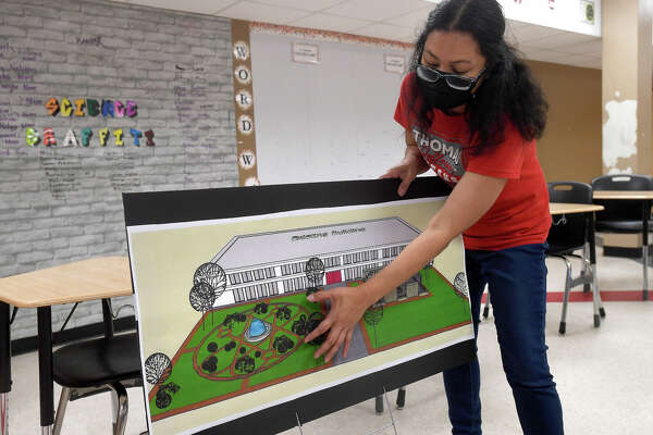 Thomas Jefferson Middle School science teacher Asther Reyes talks about the monarch butterfly preserve and habitat that she and students will create after receiving a $5,000 grant from Port Arthur LNG as part of their Environmental Champions Initiative. Photo made Wednesday, May 18, 2022. Kim Brent/The Enterprise