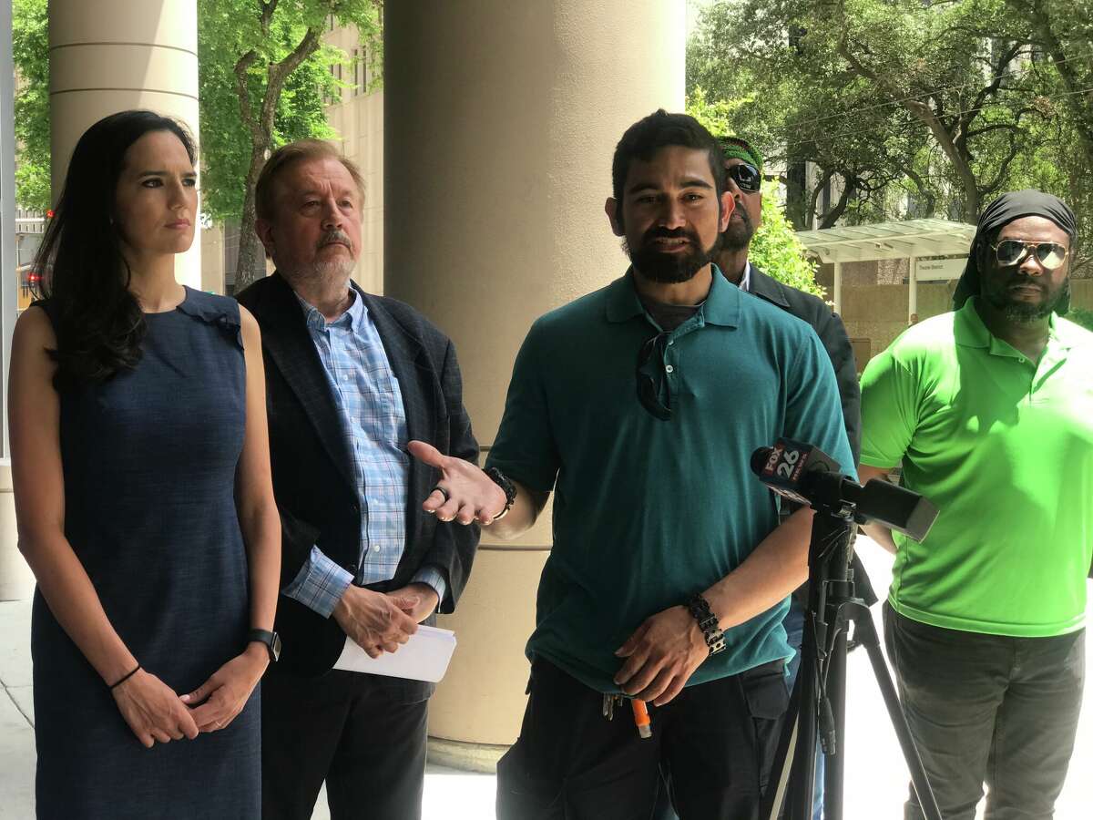 Federal civil rights lawyer Randall Kallinen and two of his clients, Morgan Grice and Maximo Espinal, on Tuesday gathered with civil rights activists outside the downtown Houston federal courtroom for a news conference demanding Hughes recuse himself. 