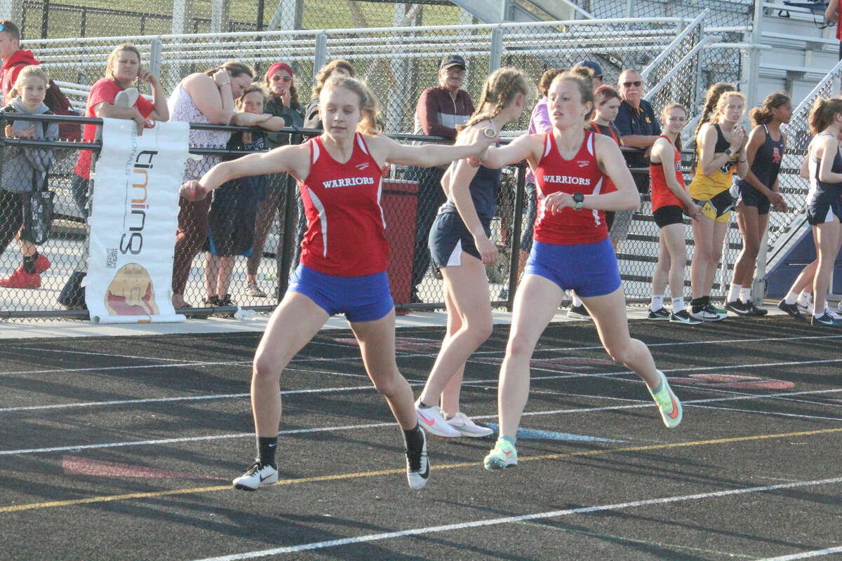 Chippewa Hills' Sarah Storey (right) is among the athletes hoping to qualify for the state meet on June 3. (File photo)