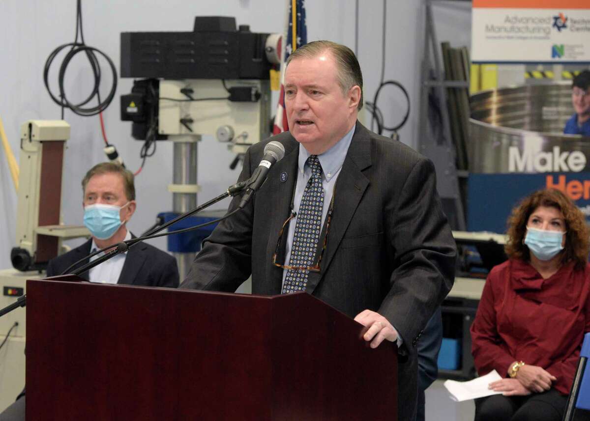 John Clark, president of Western Connecticut State University, speaks at the Feb. 11 opening of the Connecticut State Advanced Manufacturing Technology Center at the university in Danbury.