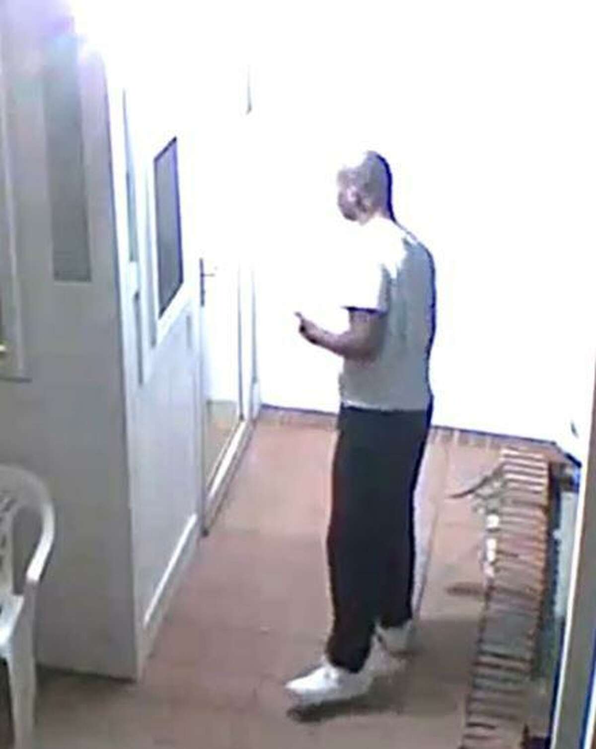 Police released video surveillance stills of this person of interest in the arson case Thursday.