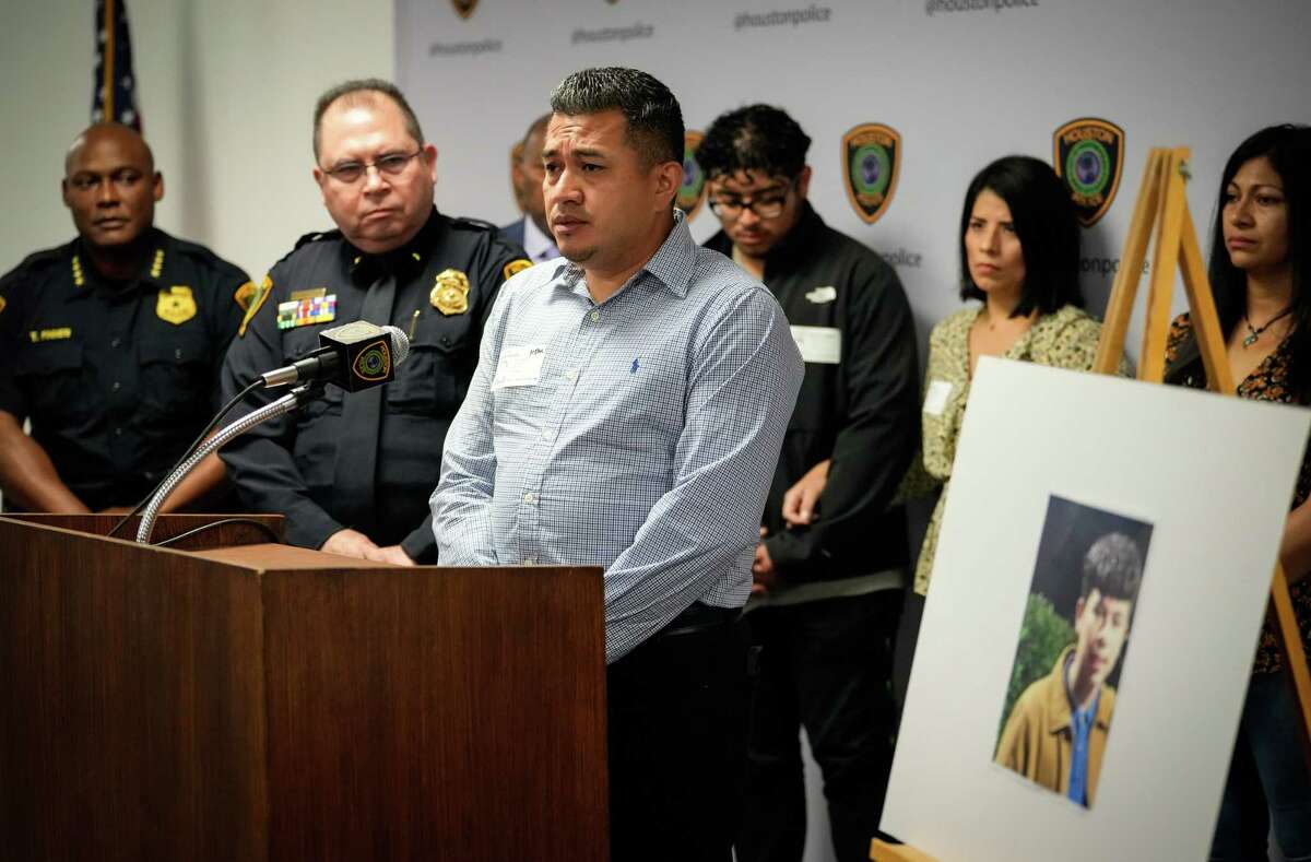 Aster Turcios asks the public for information regarding the fatal shooting of his son, Axel Turcios, during a press conference Thursday, May 19, 2022, at Houston Police headquarters in Houston. The fourteen-year-old died May 7 after being shot the previous night during a robbery, police said.