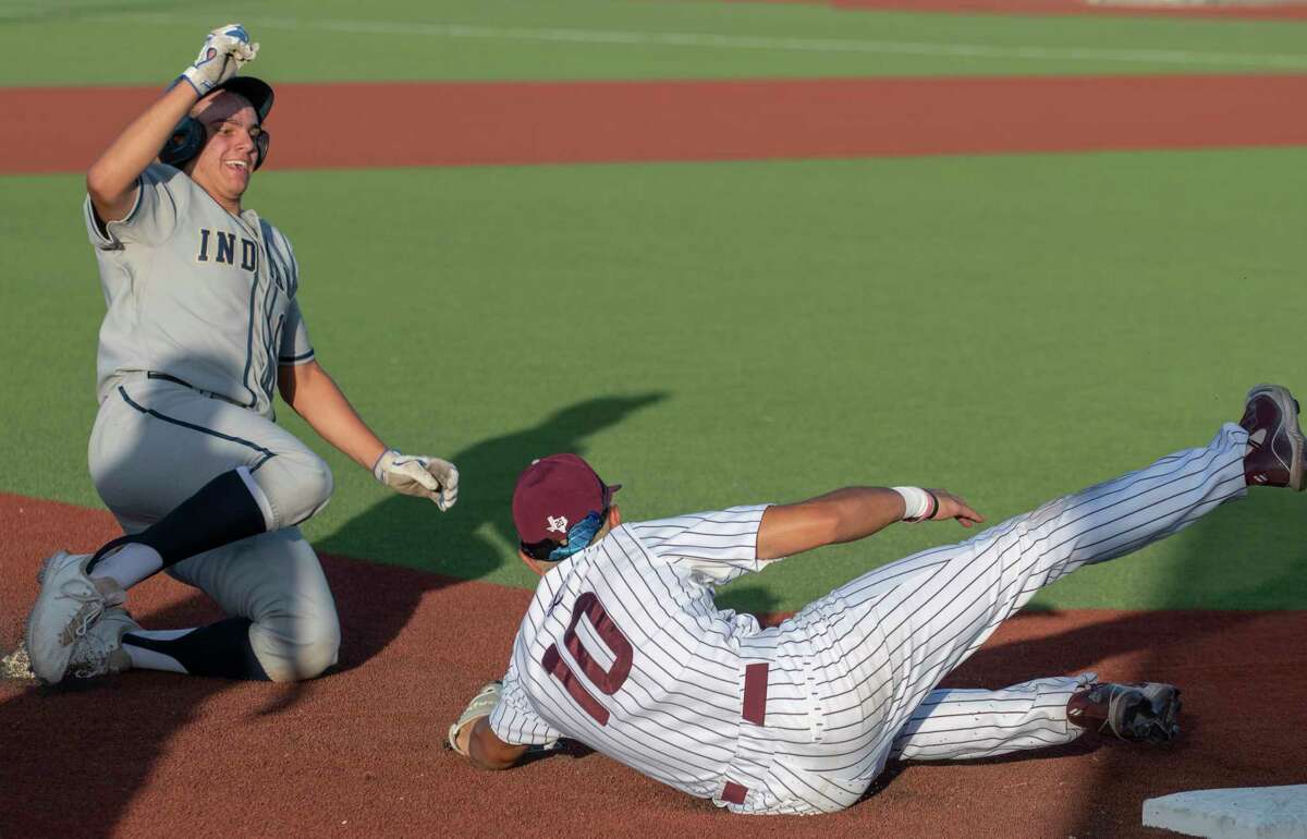 Legacy High's Raymond Vasquez dives to get the throw from home and make the tag for an out as Keller High's Mike Dattalo tries to steal third during game 1 of the Class 6A regional quarterfinal series 05/19/2022 at Ernie Johnson Field. Tim Fischer/Reporter-Telegram