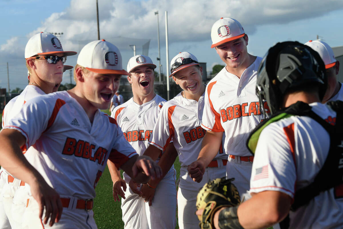 Orangefield rallies as the starting players take the field during their regional quarterfinal against Livingston at Port Neches-Groves Thursday. Photo made Thursday, May 19, 2022. Kim Brent/The Enterprise