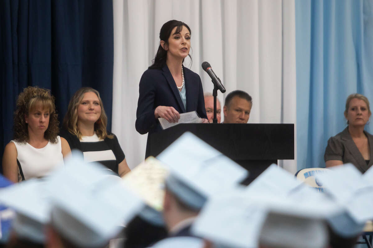 Meridian Early College High School Principal Tara E. Mager addresses the Class of 2022 as they celebrate their commencement Thursday, May 19, 2022 at the school in Sanford.