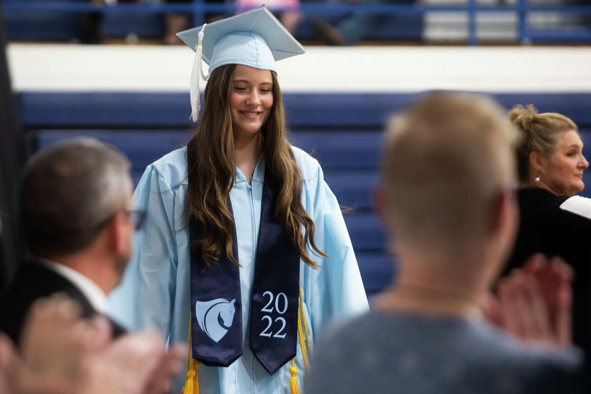 Dorothea L. Doud receives her diploma as the Meridian Early College High School Class of 2022 celebrate their commencement Thursday, May 19, 2022 at the school in Sanford.