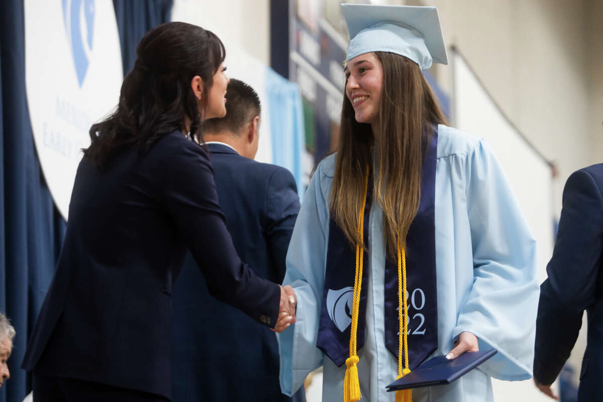 Gracie Iafrate receives her diploma as the Meridian Early College High School Class of 2022 celebrate their commencement Thursday, May 19, 2022 at the school in Sanford.