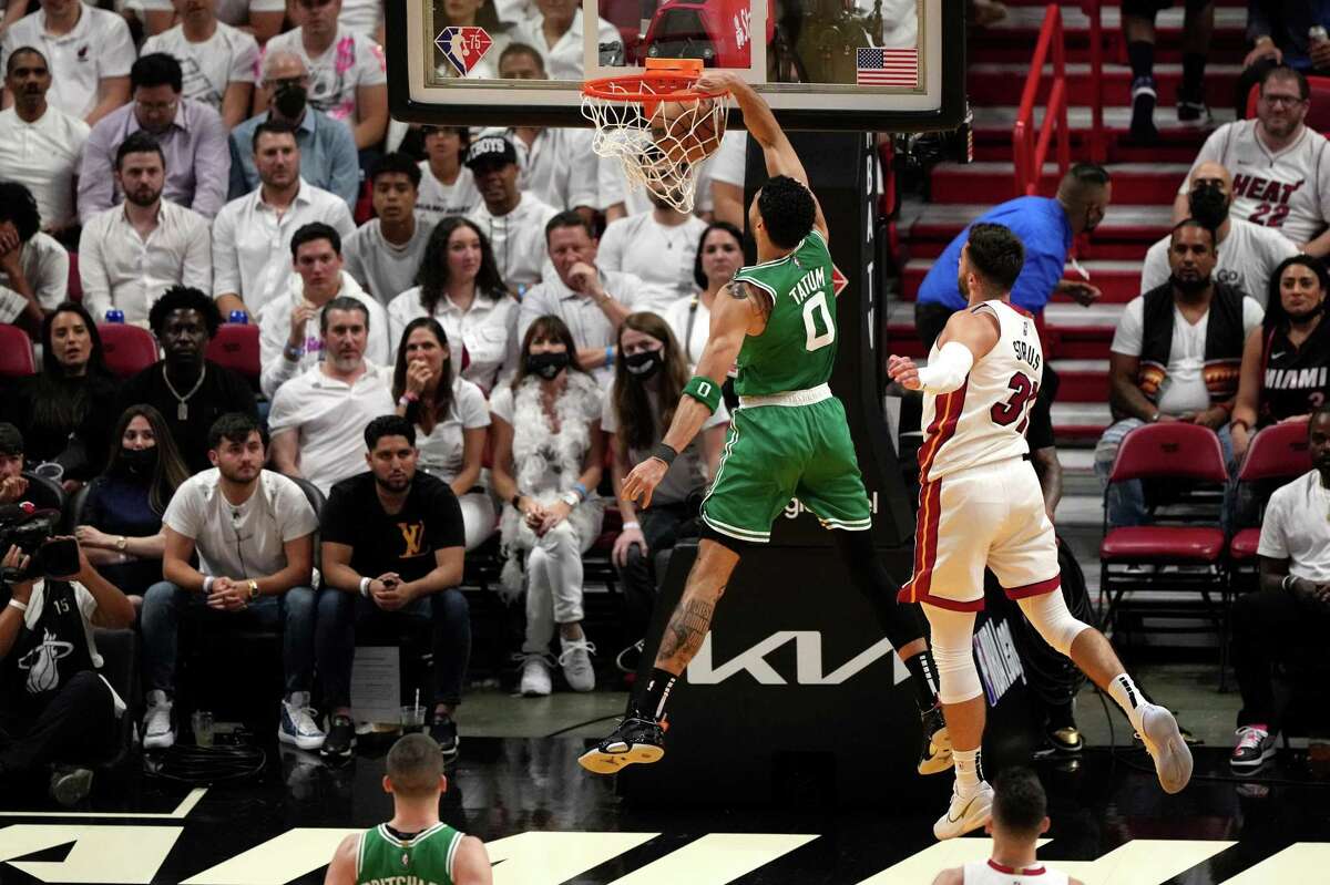 MIAMI, FLORIDA - MAY 19: Jayson Tatum #0 of the Boston Celtics dunks the ball against Max Strus #31 of the Miami Heat during the second quarter in Game Two of the 2022 NBA Playoffs Eastern Conference Finals at FTX Arena on May 19, 2022 in Miami, Florida. NOTE TO USER: User expressly acknowledges and agrees that, by downloading and or using this photograph, User is consenting to the terms and conditions of the Getty Images License Agreement. (Photo by Eric Espada/Getty Images)