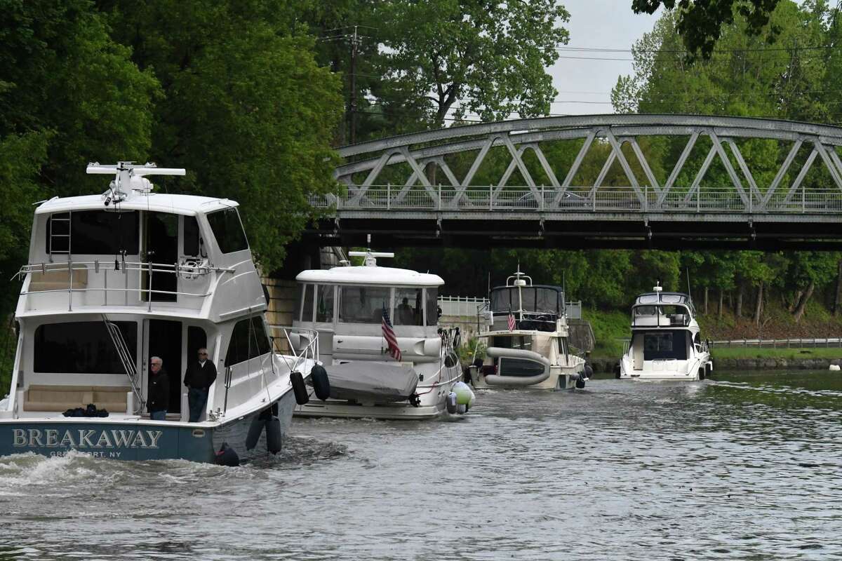 The first boats to enter Lock E-2 for the seasonal opening of the Erie Canal navigation season sail to the next lock after completing the first leg on Friday in Waterford.