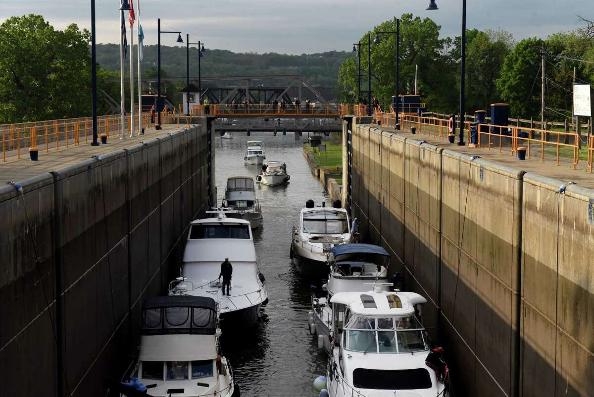 Boats enter Lock E-2 for the seasonal opening of the Erie Canal navigation season on Friday in Waterford.