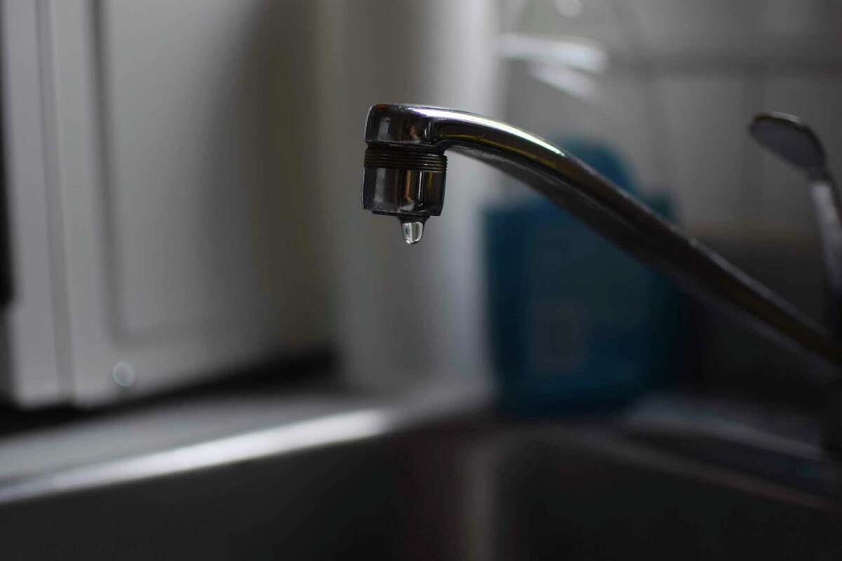 File photo — Water drips from a faucet in Montreal, Quebec, Canada. (Mackenzie Lad/Institute for Investigative Journalism/Concordia University via AP)