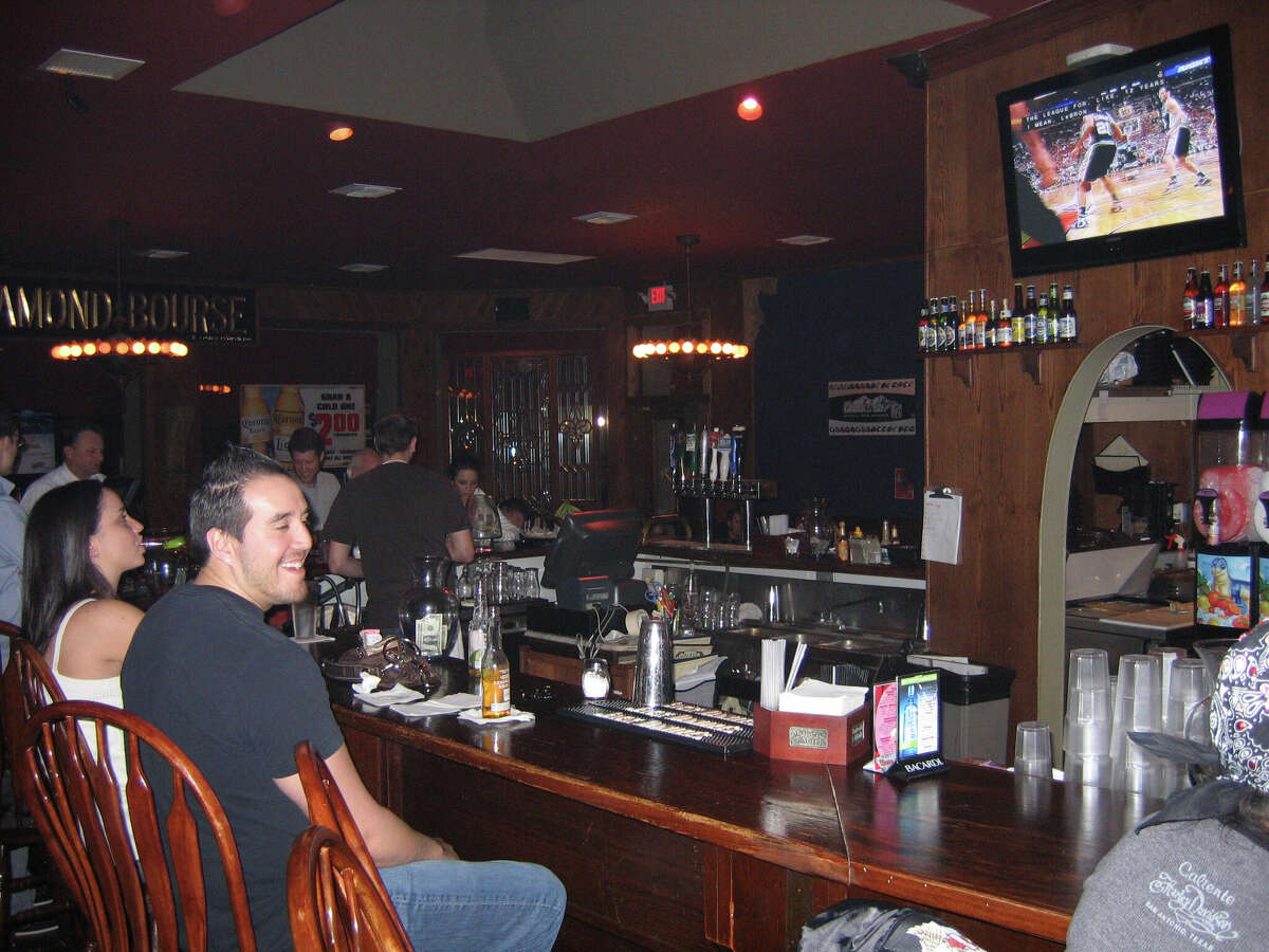 A patron takes in a game at the Highlander Bar & Grill in 2008. 