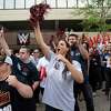 WWE Chief Brand Officer Stephanie McMahon, WWE Superstar Kevin Owens, standing behind McMahon, WWE Superstar Becky Lynch, at right, Special Olympians and WWE employees cheer on a passing group of law enforcement officials carrying a torch to the Special Olympics state Summer Games’ opening ceremonies in New Haven, during a rally on Friday, June 7, 2019, at WWE headquarters at 1241 E. Main St., in Stamford, Conn. McMahon announced on May 19, 2022, a leave of absence from the company to focus on her family.