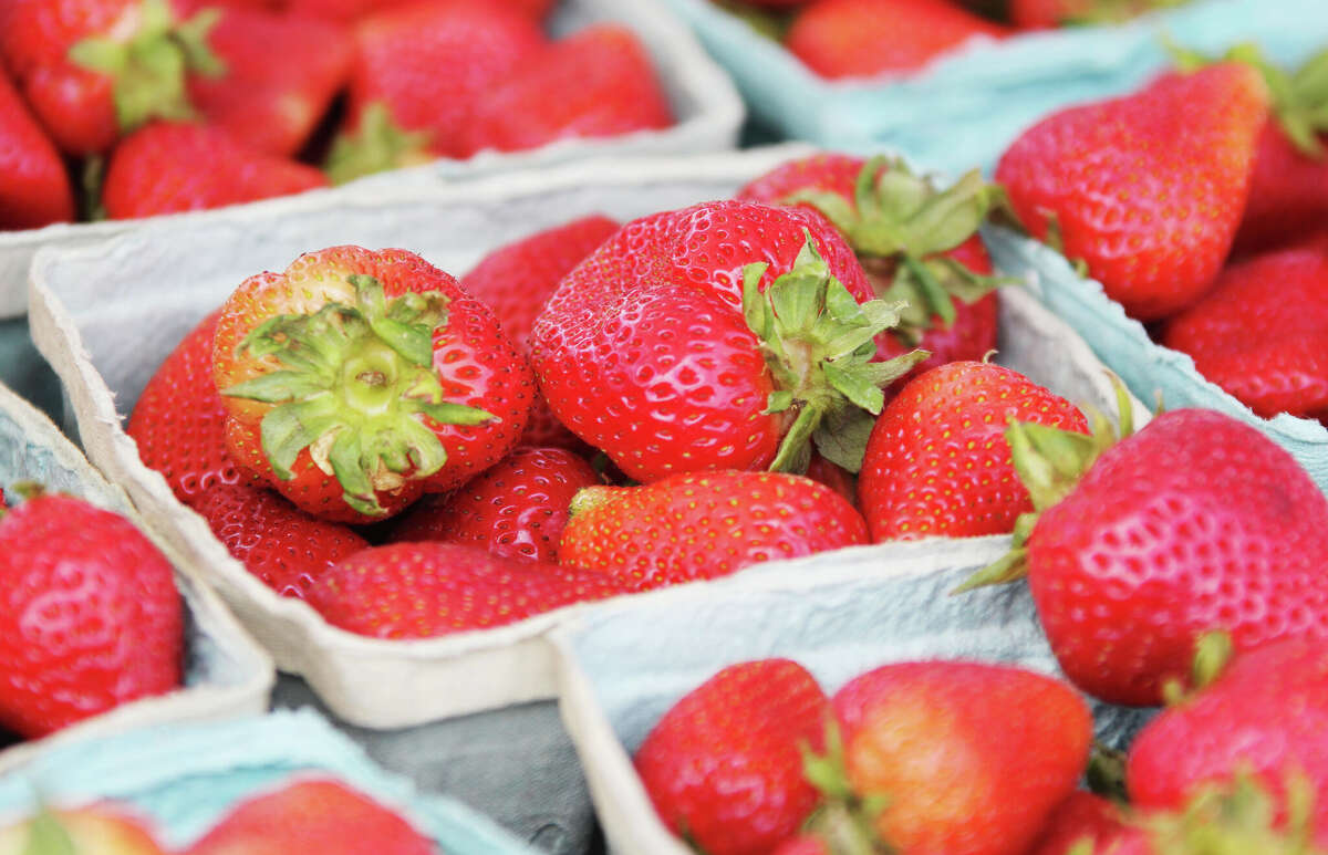 Strawberries await shoppers Tuesday afternoon at the East Alton Farmers' Market at Eastgate Plaza. The market runs 3-7 p.m. every Tuesday.