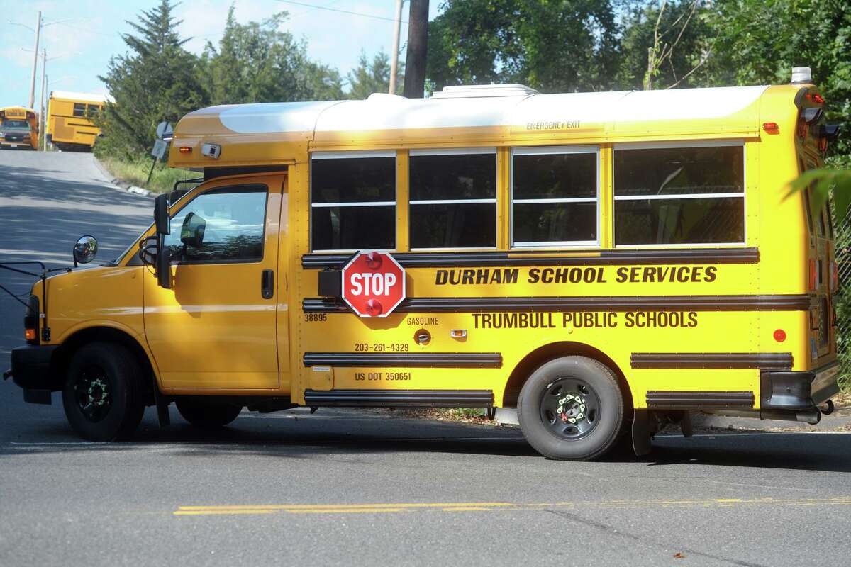 A school bus enters the Durham School Services lot in Trumbull, Conn. Sept. 23, 2020.
