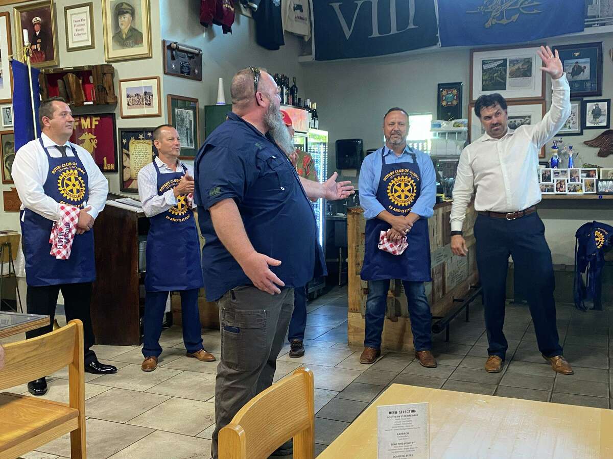 Honor Cafe owner and Conroe Rotarian Chris Sadler introduces the celebrity waiters at Tuesday’s Pancake Supper. Pictured from left are Joe Haliti, Jody Czajkoski, Gen. Steven Hummer (Ret.), Howard Wood and Morgan Luttrell.