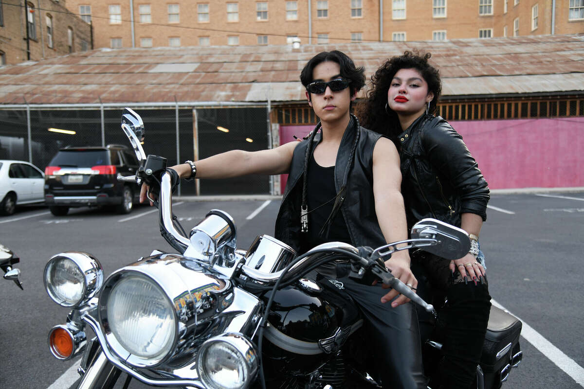 Alejandro Ramos and Princess Sada pose on a motorcycle during the Avanti Rock photoshoot in Downtown Laredo on Monday, May 16, 2022.