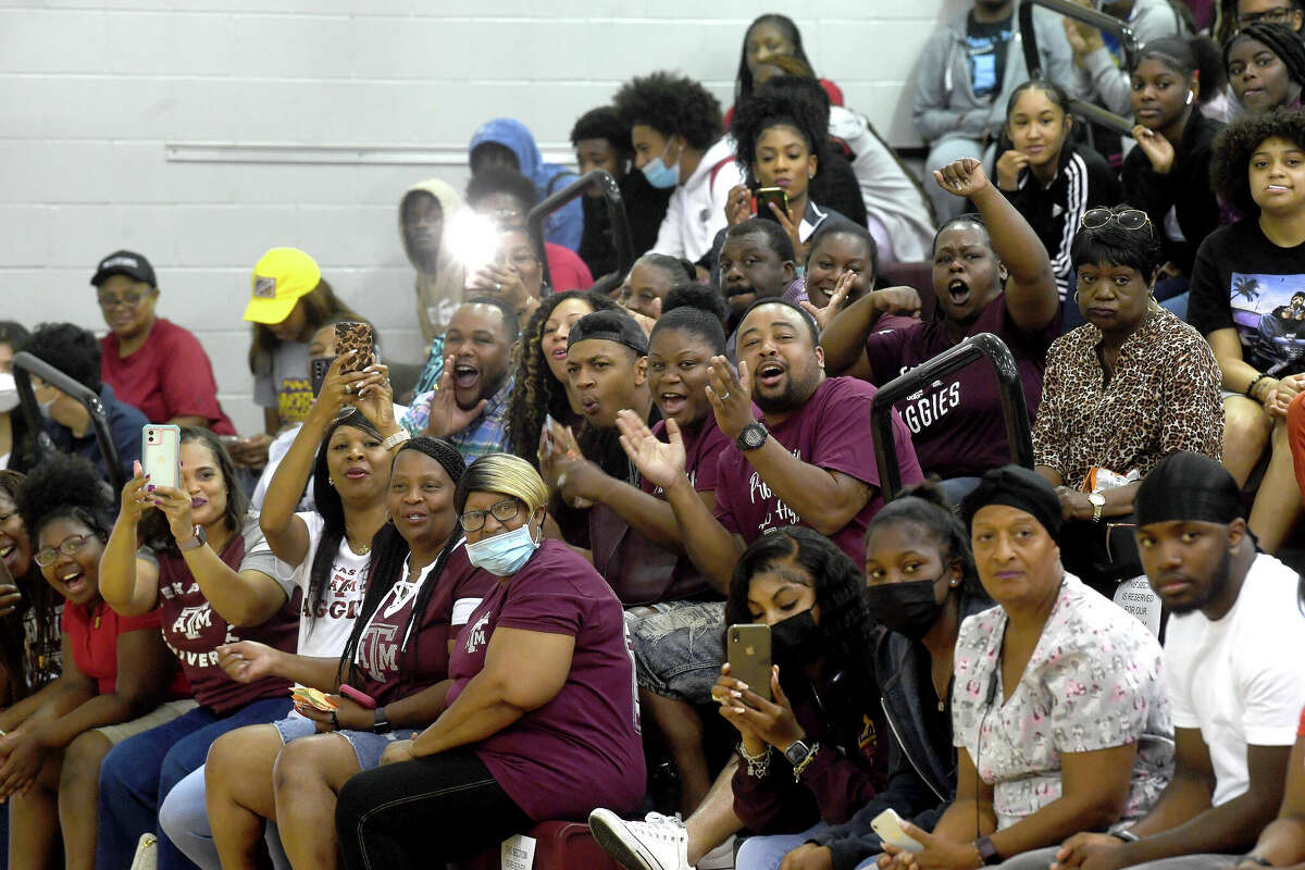 The crowd cheers as seniors are announced during a senior signing day to colleges and the military at Beaumont United. Photo made Wednesday, May 18, 2022. Kim Brent/The Enterprise