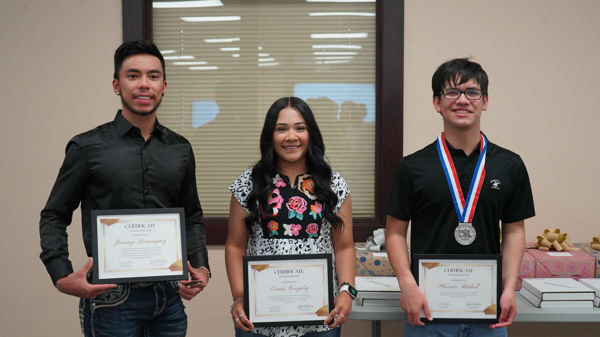 From left: Jovany Dominguez, Oemia Gonzalez and Phoenix Mitchell are recognized Thursday night during a regular school board meeting. Not pictured; Shirin Harleston
