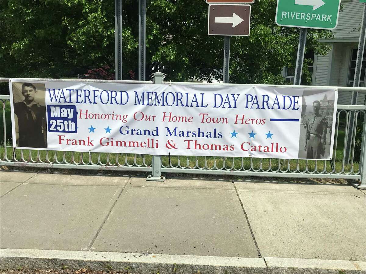 Banner near Saratoga Avenue and 8th Street in Waterford, N.Y  promoting the Waterford Memorial Day Parade and grand marshals Frank Gimmelli, left, and Thomas Catallo, right, as they appeared during World War II,