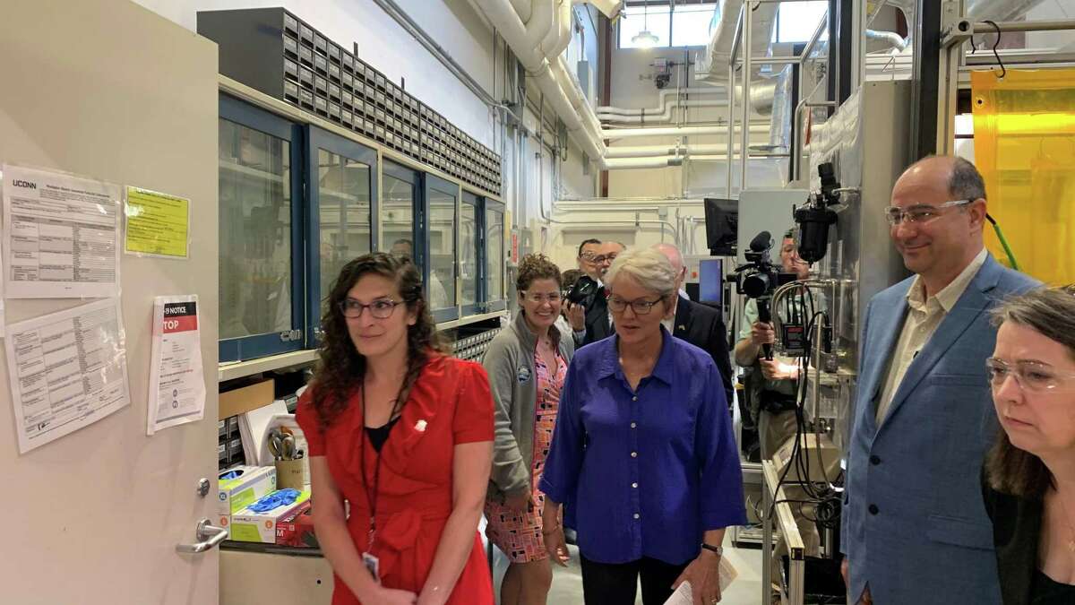Energy Secretary Jennifer Granholm, center, and U.S. Rep. Joe Courtney, D-2nd District, tour the Center for Clean Energy Engineering lab at the University of Connecticut in Storrs on Friday, May 20, 2022.