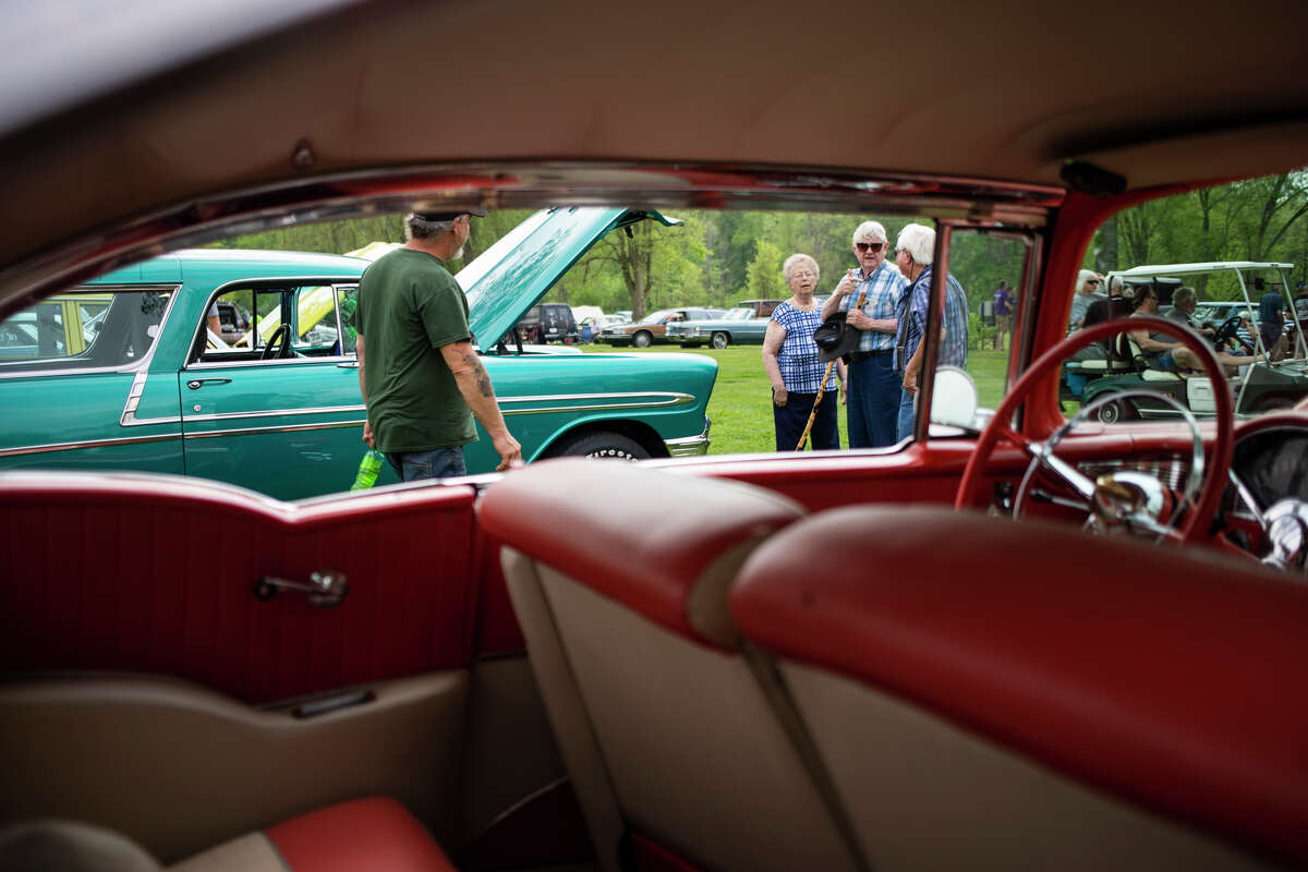 Car enthusiasts attend the Sanford Rising Car Show on Friday May 20, 2022 at Porte Park.