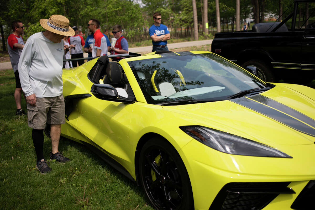Car enthusiasts attend the Sanford Rising Car Show on Friday May 20, 2022 at Porte Park.