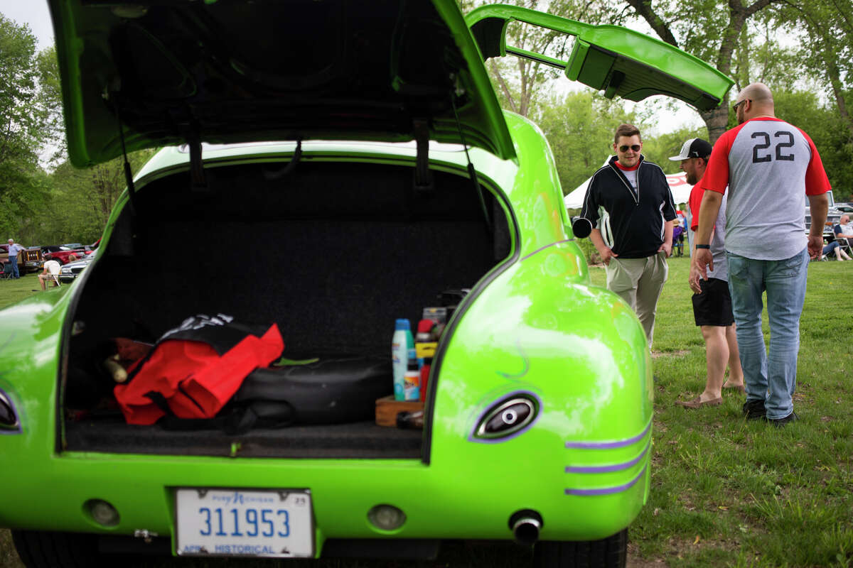 Car enthusiasts attend the Sanford Rising Car Show on Friday May 20, 2022 at Porte Park.