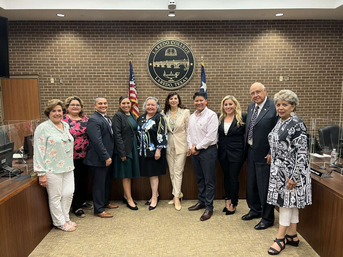 Laredo College's next president Dr. Maria Minerva "Minita" Ramírez, center, is pictured with Board President Lupita Zepeda, to her left, Interim President Dr. Marisela Rodriguez Tijerina, second to her left, and other members of the LC Board of Trustees on Thursday, May 19, 2022. 