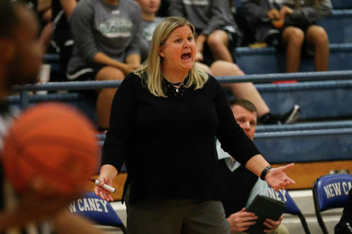 Kingwood Park head coach LeighAnn Wolfe guides her team during the high school girls basketball game against New Caney on Friday, Dec. 1, 2017, at New Caney High School. (Michael Minasi / Houston Chronicle)