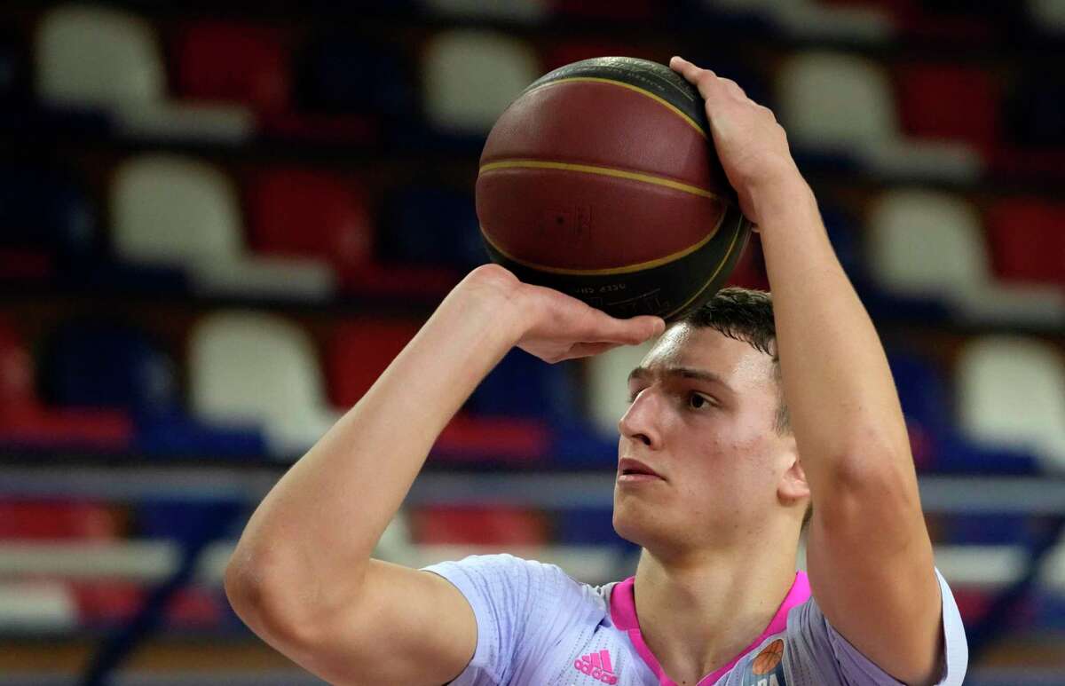 Nikola Jović of Mega tries to score during the ABA League basketball match between FMP and Mega in Belgrade, Serbia, Saturday, Jan. 29, 2022. Nikola Jović of Serbia is one of the top international prospects heading into this year's NBA draft. Still just 18 years old the 6-foot-10 Jović plays several positions for his Belgrade club Mega. He scores inside as well as from 3-point range.