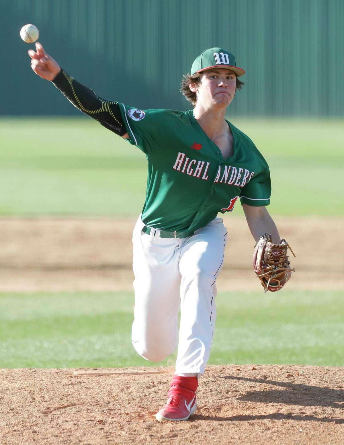 The Woodlands pitcher Tyler Sunseri (11), shown here earlier this season, pitched a two-hit shutout Friday night in the Region II-6A quarterfinals against Grand Oaks.