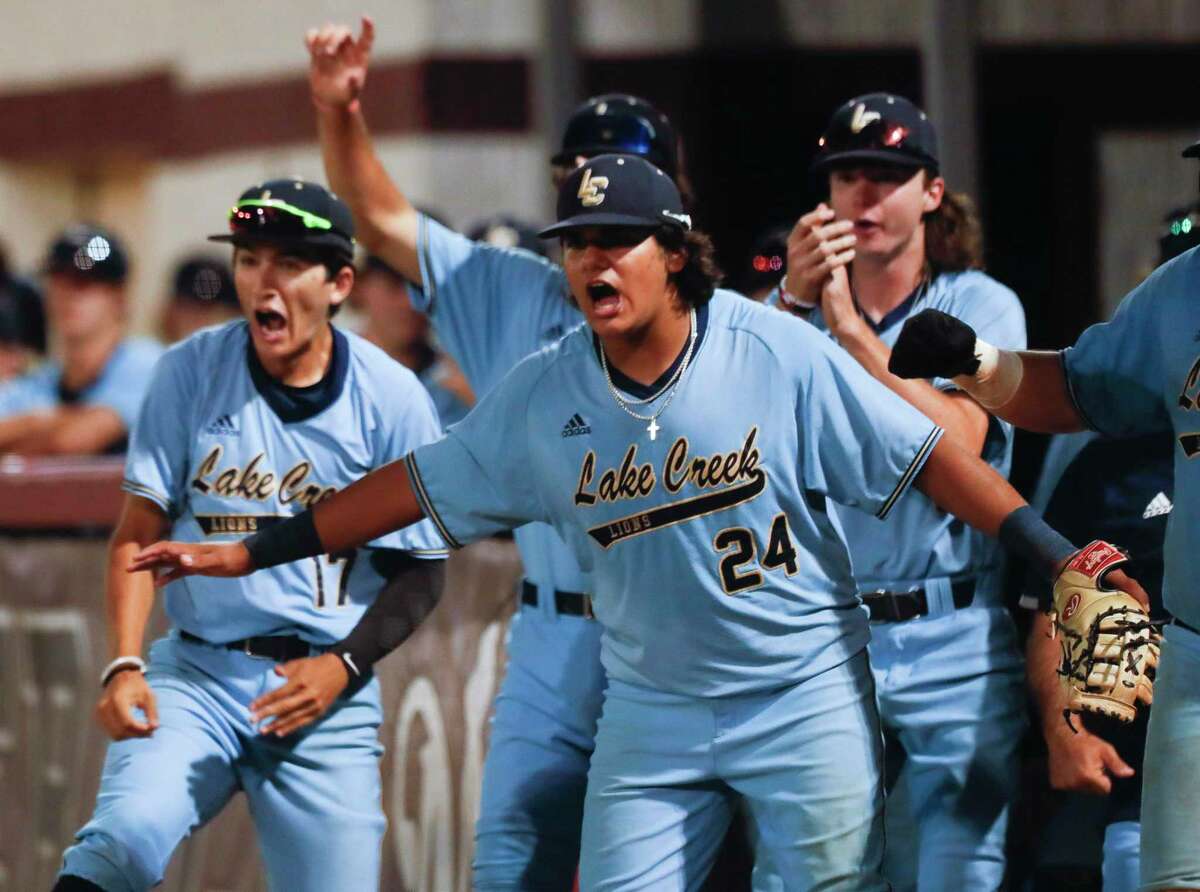 Ethan Uribe #24 of Lake Creek reacts after Sam Lee scores on a wild pitch by Magnolia starting pitcher Nathan Love in the fourth inning of Game 2 during a Region III-5A quarterfinal high school baseball playoff series at Magnolia High School, Friday, 20, 2022, in Magnolia.