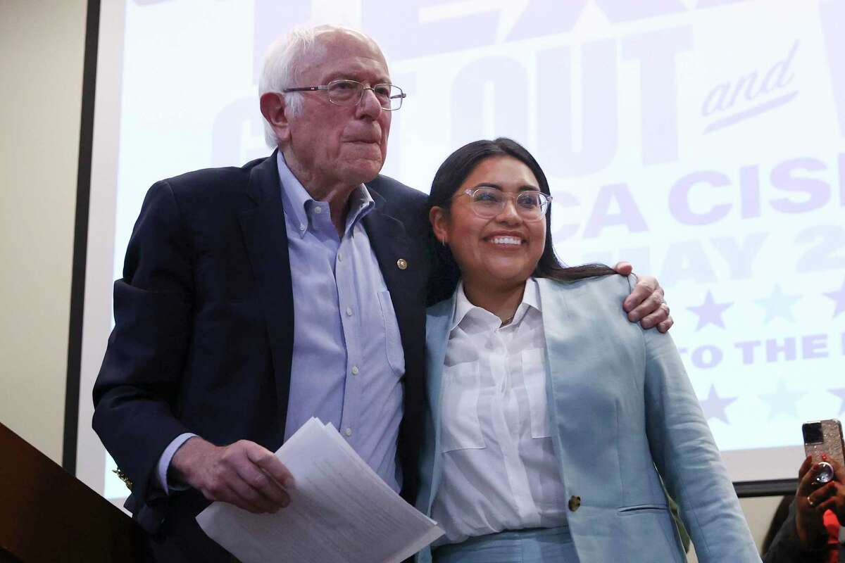 Vermont Congressman Bernie Sanders (left) and Texas District 28 Candidate Jessica Cisneros hug after speaking at a voting rally at Second Baptist Church on Friday, May 20, 2022. Cisneros is in a run-off against current representative Henry Cuellar.