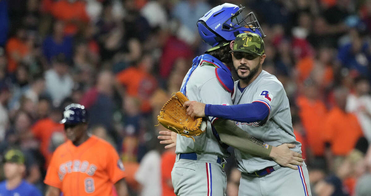 Texas Rangers starting pitcher Martin Perez throws during the