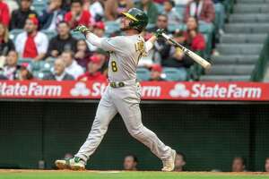 A’s beat Angels 4-2, as Lowrie and Brown home runs back strong pitching