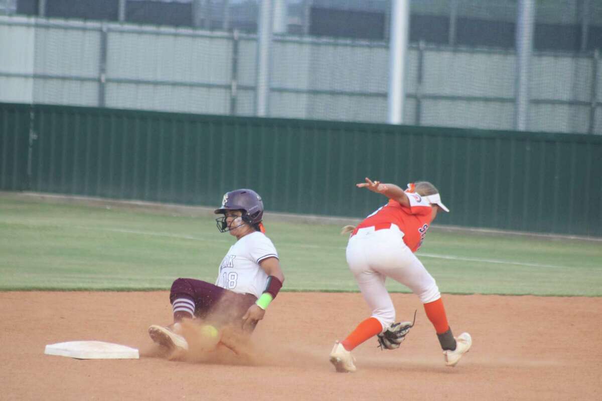 Kayla Zaid steals second base in the third inning and kept going to third, setting up the team's second run of the night. The Lady Deer were 6-of-6 in steals Friday night.
