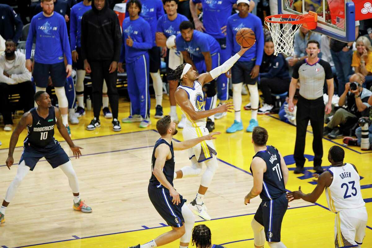 Golden State Warriors guard Moses Moody (4) scores during the fourth quarter in Game 2 of the Western Conference finals against the Dallas Mavericks at Chase Center, Friday, May 20, 2022, in San Francisco, Calif.