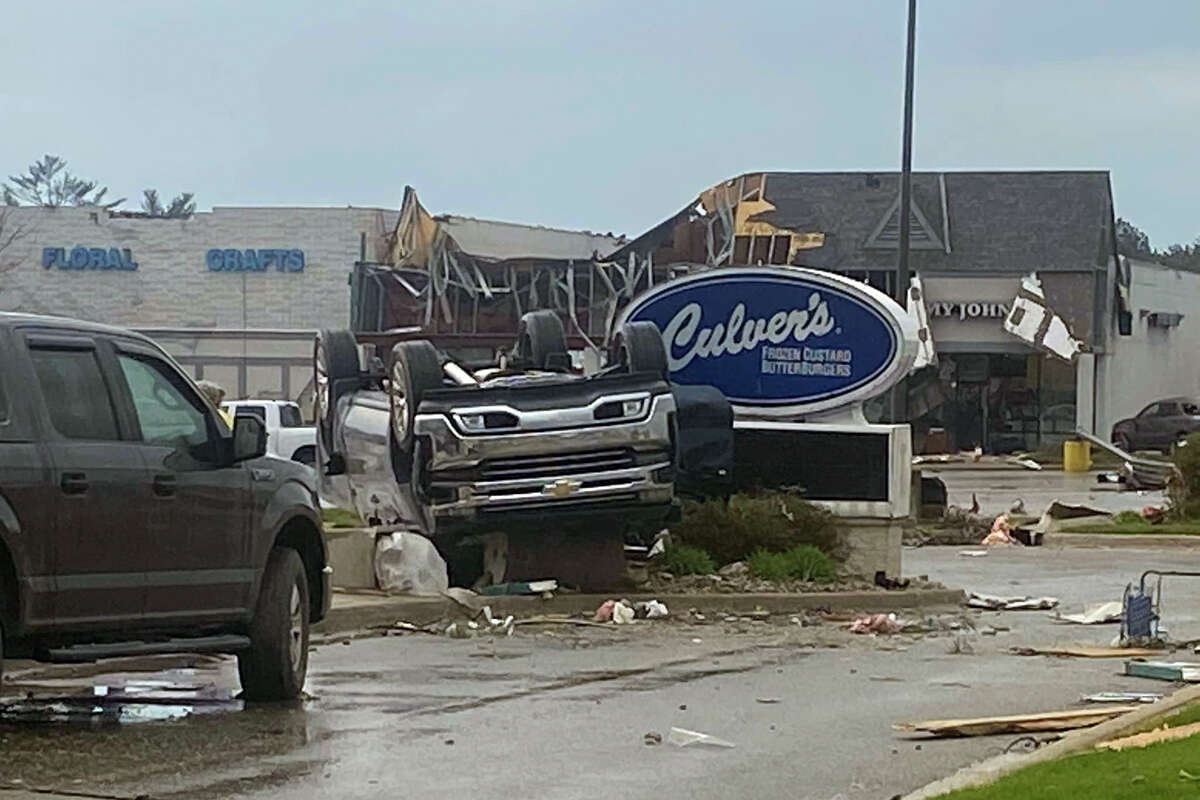 This image provided by Steven Bischer, shows an upended vehicle following an apparent tornado, Friday, May 20, 2022, in Gaylord, Mich. (Steven Bischer via AP)