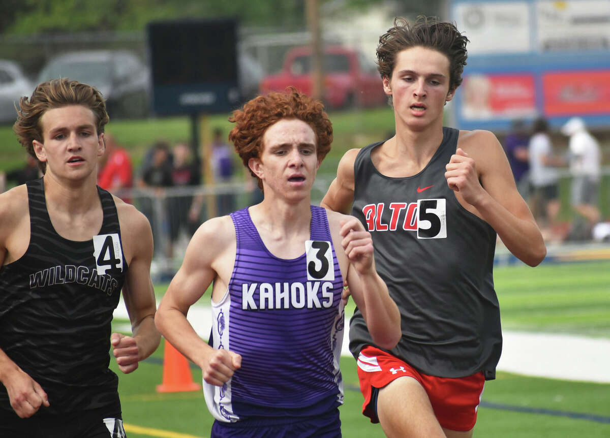Alton's Johnathan Krafka (right) runs with  Collinsville’s Trey Peterson and Normal West’s Luke Reinhart (left) in the 800 meters on Thursday at the O’Fallon Class 3A Sectional. Reinhart finished second in the race, with Krafka third and Peterson fourth.