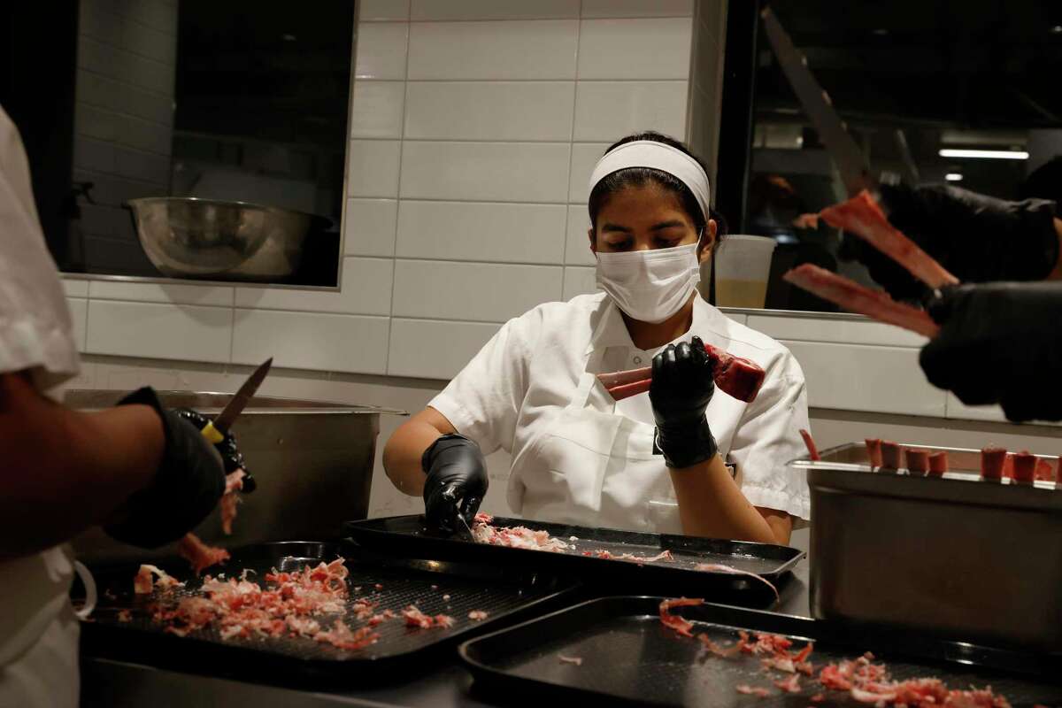 Californios commis Siddhi Balaji, whose name is listed on the Michelin-starred restaurant’s menu, preps for dinner on Friday, May 20, 2022.