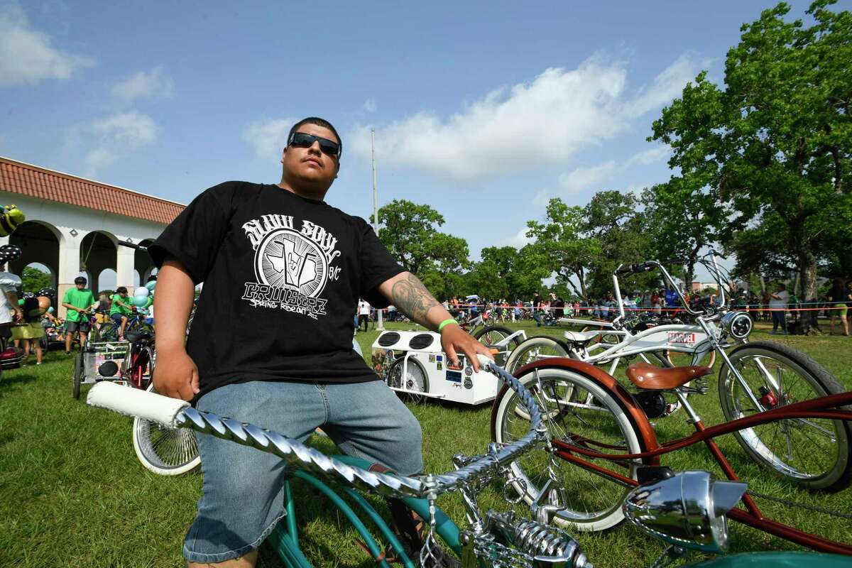Cesar Avila sits on his art bike during Houston’s first Art Bike Festival in MacGregor Park Saturday, May 21, 2022, in Houston, Texas.