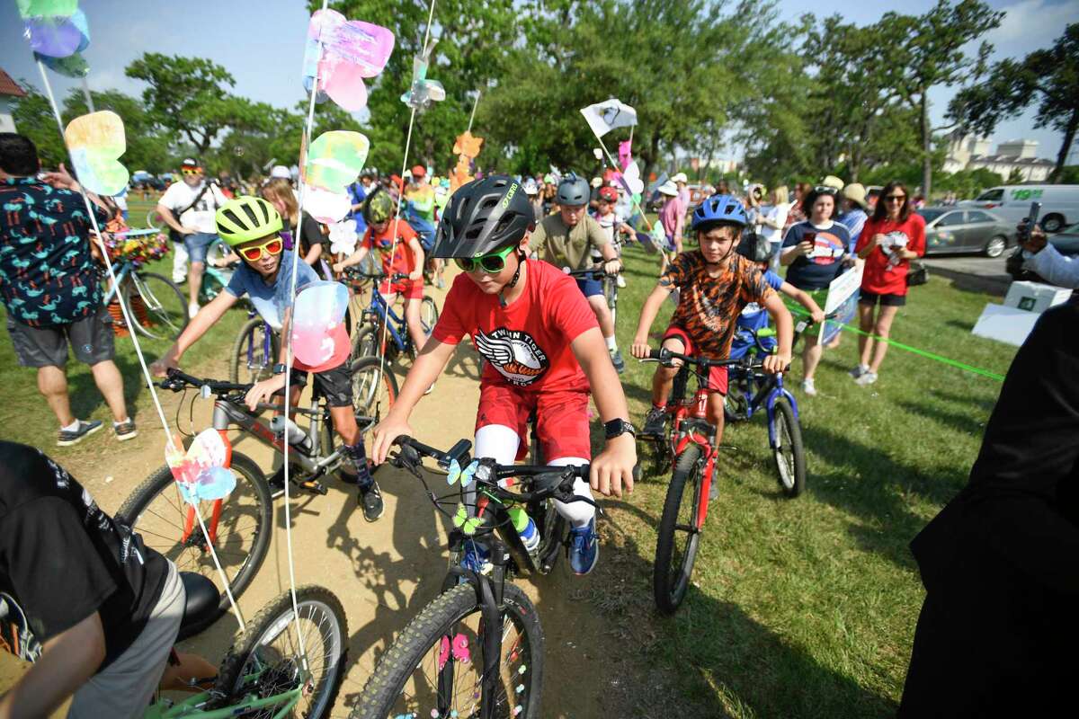 Art bike riders start the art bike parade during Houston’s first Art Bike Festival in MacGregor Park Saturday, May 21, 2022, in Houston, Texas.