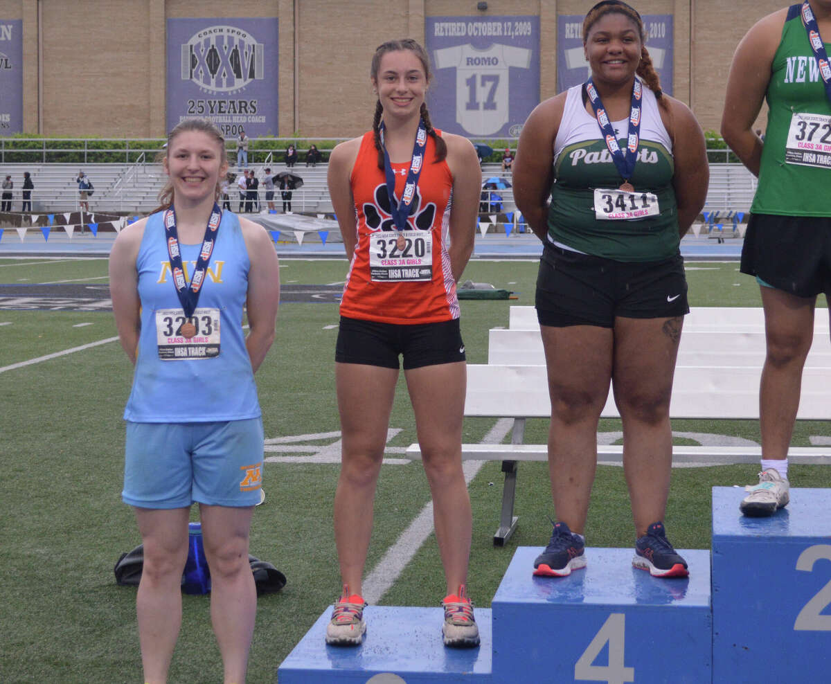 Kaitlyn Morningstar, second from left, placed sixth in discus at the Class 3A state track and field meet at Eastern Illinois University in Charleston.