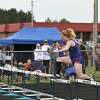 MCC junior Kaitlyn Duke's right foot catches the top of a hurdle at regionals on Saturday, May 21 at Brethren High School. 