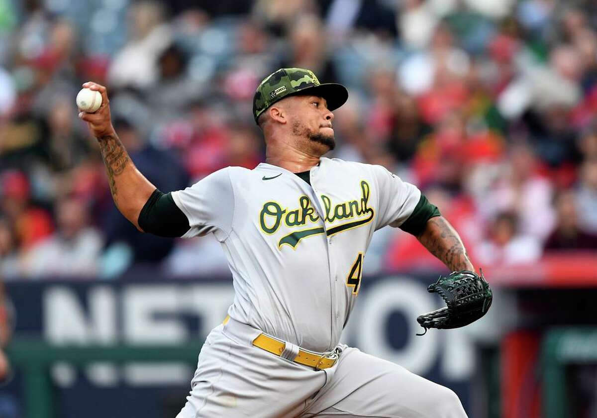 ANAHEIM, CA - MAY 21: Starting pitcher Frankie Montas #47 of the Oakland Athletics throws against the Los Angeles Angels during the first inning at Angel Stadium of Anaheim on May 21, 2022 in Anaheim, California. (Photo by Kevork Djansezian/Getty Images)