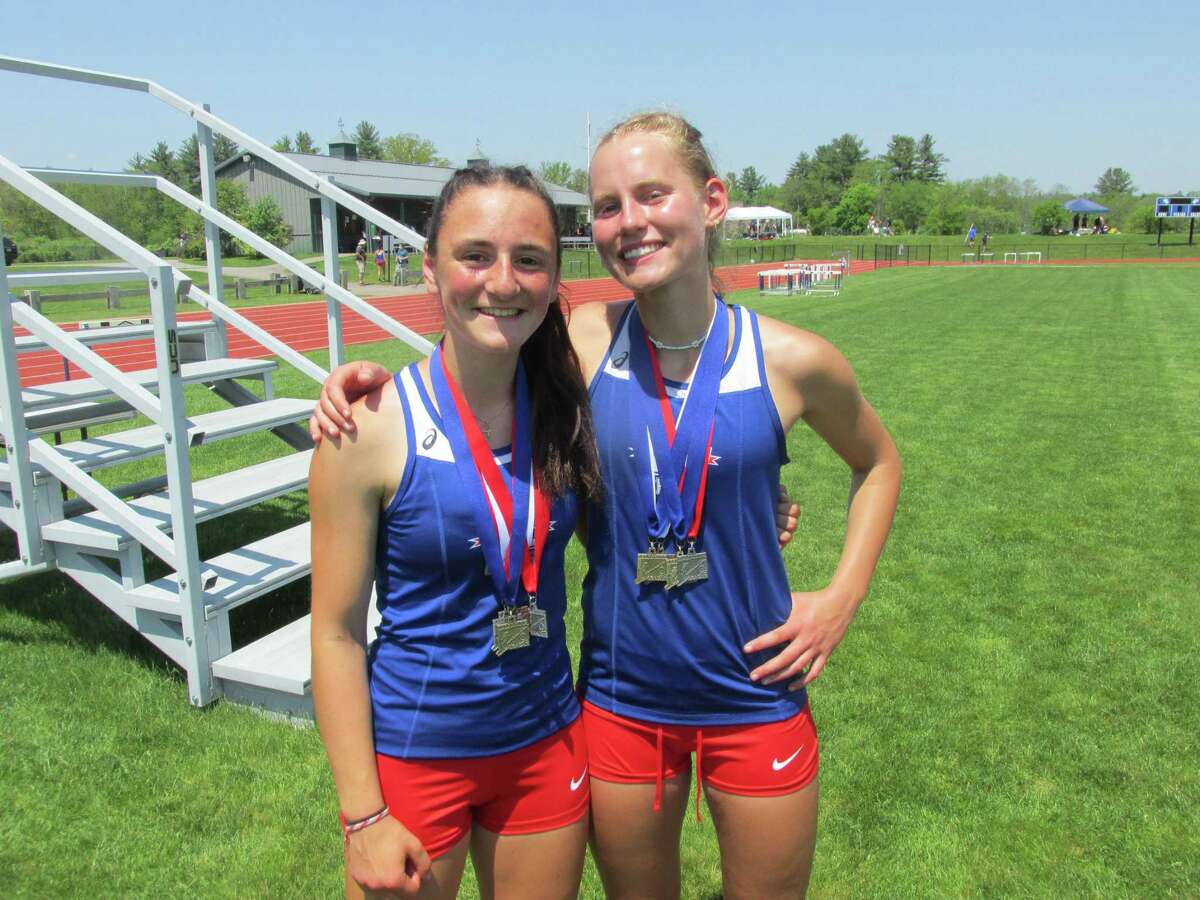 Nonnewaug’s Gianna Lodice, left, and Sammi Faull played huge roles in the Chiefs’ girls team win in Saturday’s Berkshire League Track and Field Championship Meet at Plum Hill Sports Complex in Litchfield.