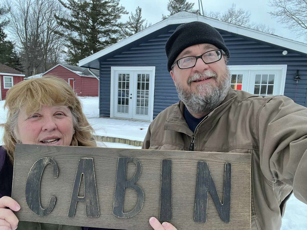 Carol Cox, left, and fiance Bri Heiser, of Center Line, ought their Wixom Lake house in February.