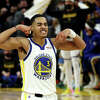 Golden State Warriors guard Jordan Poole celebrates a basket against the Dallas Mavericks at Chase Center on May 20, 2022 in San Francisco, California.