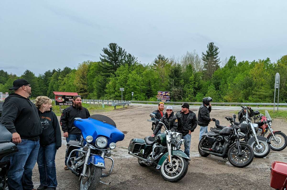 Bikers return to Rooster's Corner Saturday in Gladwin County after a five-hour ride in the rain to raise funds for the Gladwin County Veteran's Relief Fund.